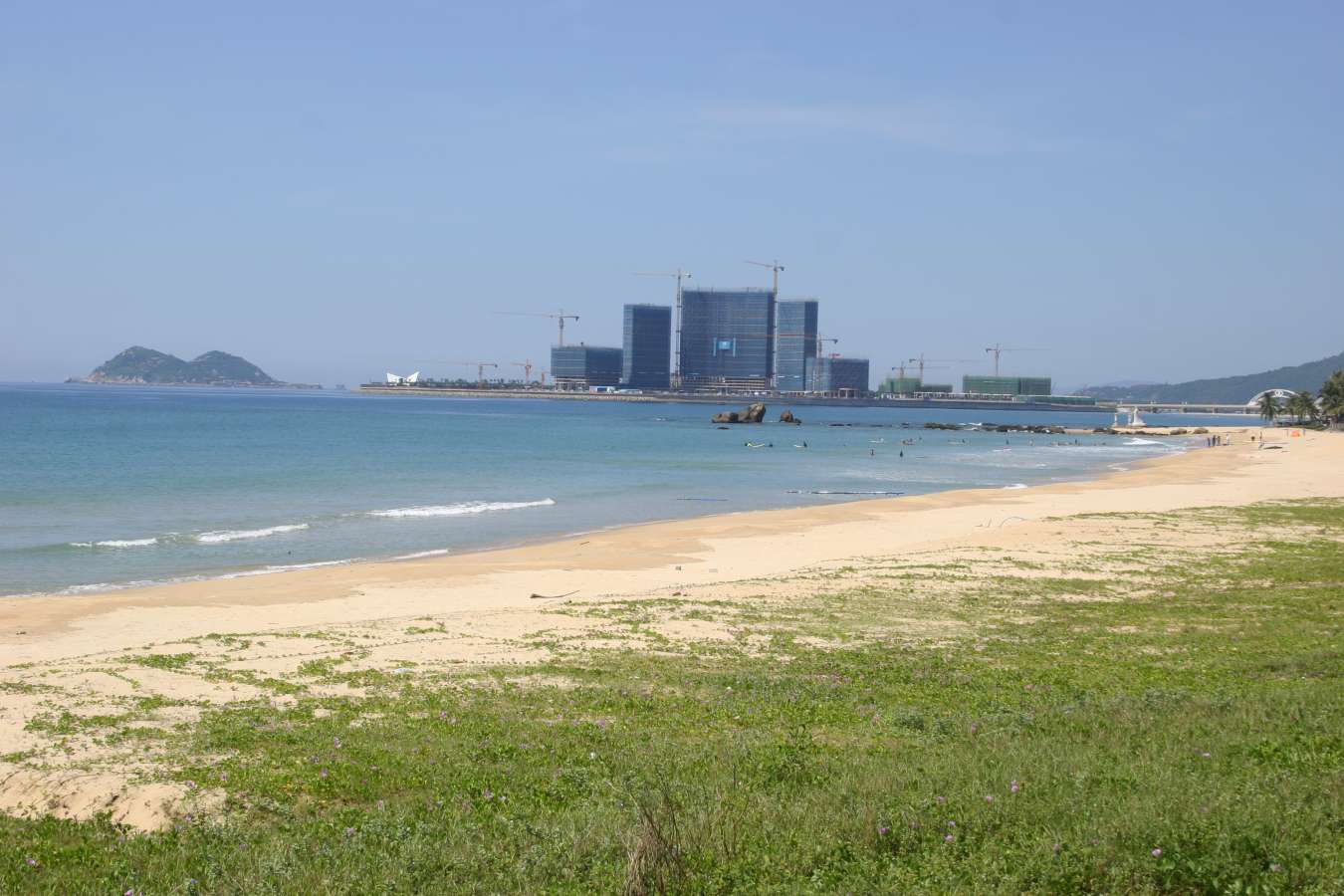 Riyue Bay Development in the background and the beach break in front of the surf club.